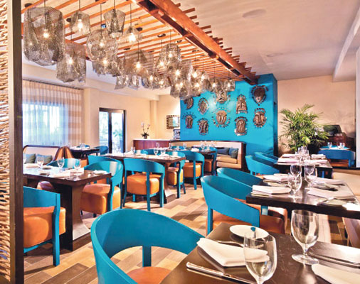O Restaurante Le Michel prepara o tradiconal poulet djon-djon